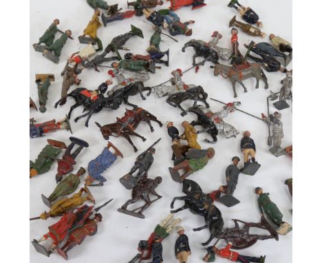 A collection of Vintage lead soldiers, cowboys, and other figures 