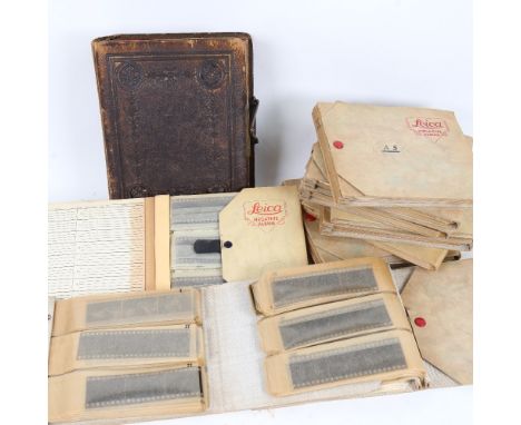 A large group of Vintage Leica negative albums, and a Victorian embossed leather empty photograph album 