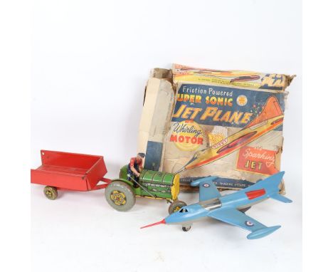 A Vintage Mettoy tinplate tractor and trailer, and a Marx jet plane (2) 