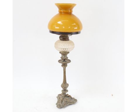 An Antique embossed brass oil lamp, with cut-glass font, height 50cm 