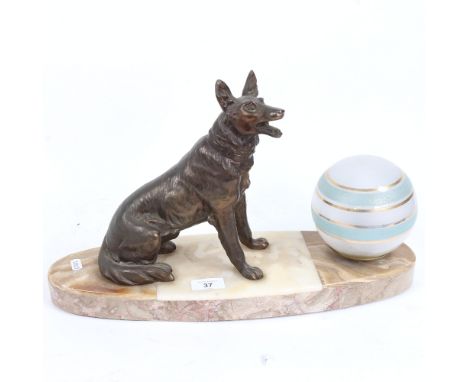 An Art Deco figural Alsatian dog lamp, sectional veined marble base, with spelter figure and original gilded glass shade, bas