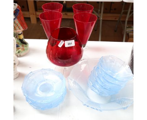 A Vintage blue glass dessert set, a set of 4 red glass vases, and a Brandy balloon 