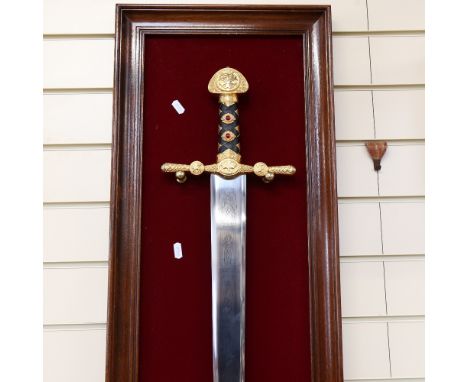 A Franklin Mint display sword of the Holy Roman Empire, series 64734, on display bracket, blade length 83cm, with original ad