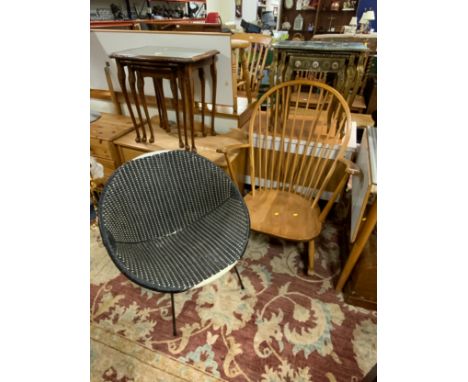 An Ercol rocking chair together with a retro chair. (2) 