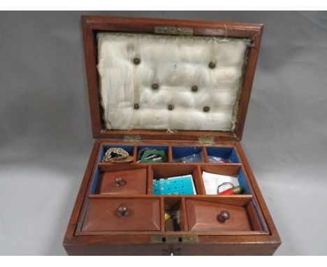 A vintage sewing box and contents 