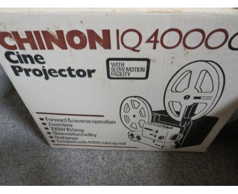 A  boxed Prinz Super 8 Oxford 500 film editor together with a boxed Chinon cine projector 