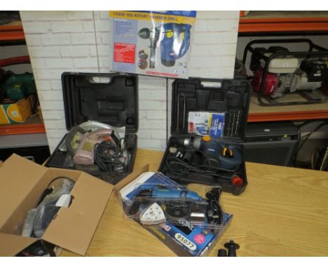 A selection of boxed power tools to include a circular saw and rotary hammer drill (House clearance / not tested) 