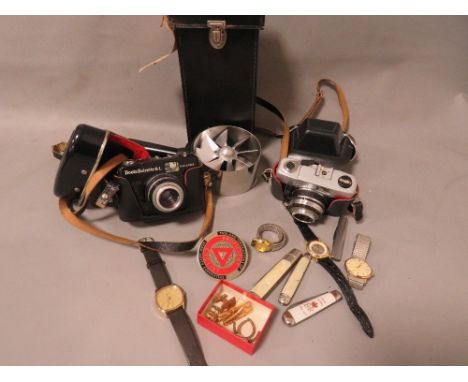 A tray of collectables to include vintage cameras, pocket knives etc