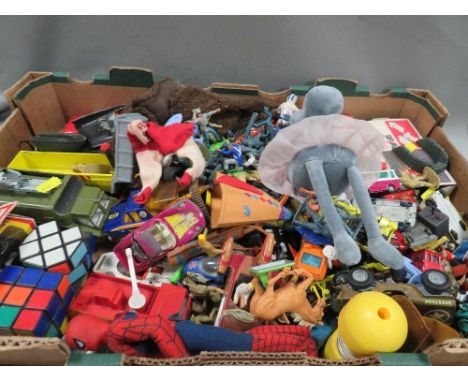 A tray of assorted vintage toys to include die cast, Rubix cube etc