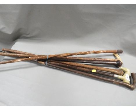 A collection of vintage walking canes 