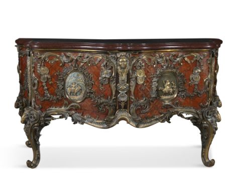 A FRENCH ORMOLU-MOUNTED TULIPWOOD KINGWOOD AND PARQUETRY COMMODE AFTER THE MODEL DESIGNED BY THE SLODTZ BROTHERS AND EXECUTED