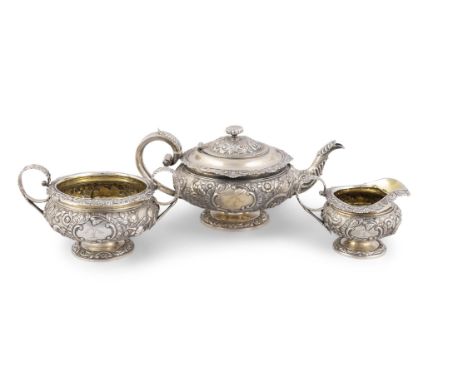 A SCOTTISH GEORGE IV SILVER TEA SERVICE, Edinburgh, circa 1820, maker's mark of JH, comprising...(of clan Dunlop), teapot (c.