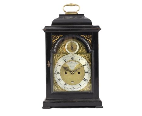 A GEORGE III EBONISED BRACKET CLOCK BY FRANCIS DORRELL LONDON CIRCA 1770the dome-top case with brass swing handle, above an a
