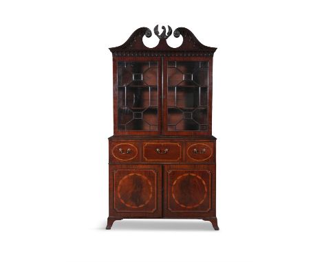 AN IRISH GEORGE III INLAID MAHOGANY LARGE SECRETAIRE BOOKCASE, with broken pediment and scroll rosette terminals, centred by 