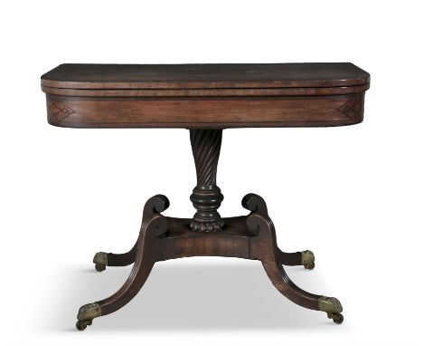 A GEORGE IV INLAID MAHOGANY FOLDING TOP TEA TABLE,the cross banded top, above a frieze decorated with ebony stringing, raised