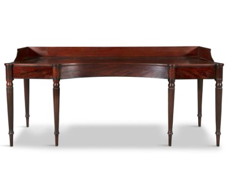 A GEORGE IV MAHOGANY SERVING TABLE CIRCA 1825,the inverted bowfront top, with three quarter gallery above two frieze drawers 