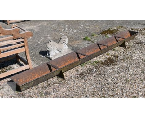 A vintage weathered long cast iron pig trough, 318 cm x 35 cm x 25 cm h