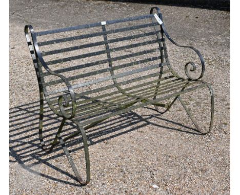 A traditional Victorian style wrought iron two seat bench, 112 cm long