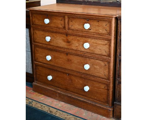 A Victorian pine and fruitwood chest of drawers with ceramic handles and penwork/painted decoration, 106 x 52 x 98 cm high