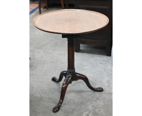A 19th century mahogany 'birdcage' table, the circular tilt-top on four pillar platform mount, turned gun barrel column and t