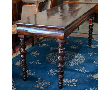 An antique mahogany and walnut console/serving table, with moulded frieze raised on barley-twist supports, 188 x 68 x 84 cm h