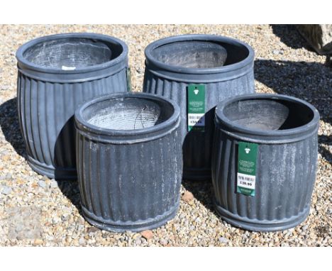 Four Chelsea Terrace fireclay churn style planters, two @ 29 cm h, two @ 35 cm h (4)