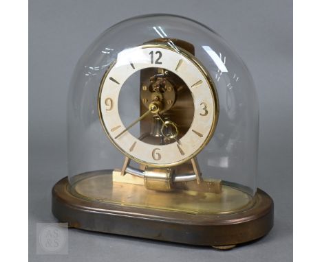 A Kundo Electronic mantel clock under dome, 23 cm high