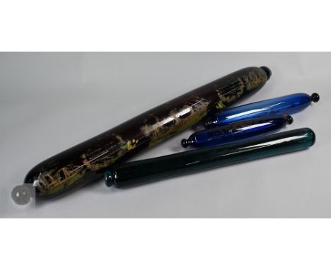 An early 19th century unusually large amethyst glass rolling pin, decorated with vestigial maritime motifs, including ships, 