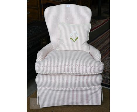 A low bedroom chair with Susie Watson pink and white striped upholstery and c/w matching cushion 