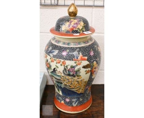 An Asian ceramic baluster vase and cover printed and painted with birds and flowers 51 cm 