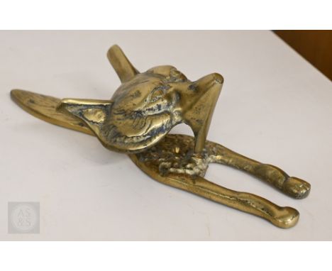 A brass 'Fox' door-knocker, 25cm high