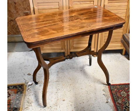 A late Victorian inlaid rosewood side table on shaped supports united by mid-height stretcher, 74 x 44 x 70 cm high