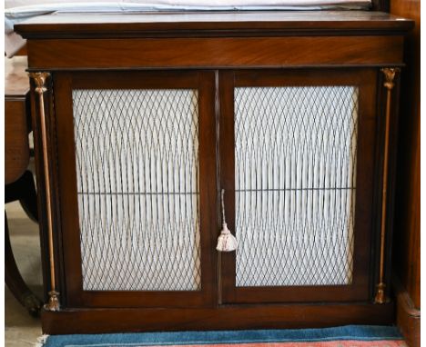 A Victorian rosewood chiffonier with fabric panels behind lattice wire doors between gilt metal mounts, 104 x 40 x 90 cm high