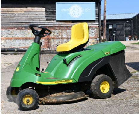 A John Deere CR35 automatic tractor mower c/with fabric grass bag, running when removed from a private residence but requires