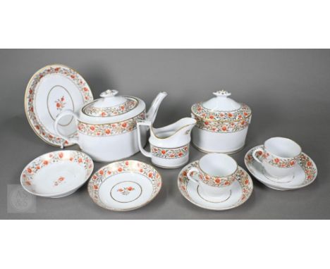 A Regency porcelain teapot on stand with milk and sugar pair, two cups and four saucers, painted in iron-red and gilded with 