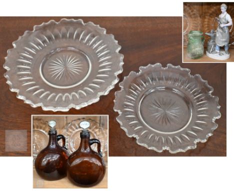 A pair of Victorian brown glass bottles, the stoppers inscribed for 'Brandy' and 'Whiskey', to/w a green iridescent glass jug