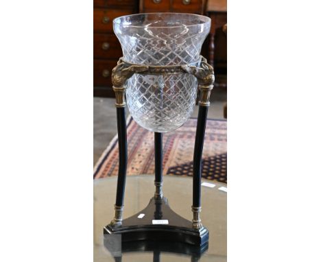 A cut and etched glass bowl on brass and slate tripod base, 52 cm