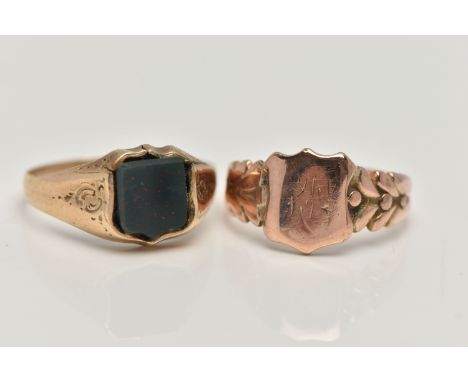 TWO SIGNET RINGS, to include a shield shape signet ring with worn engraved initials, floral shoulders leading onto a polished