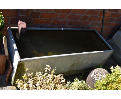 A MODERN GALVANIZED METAL WATER TROUGH width 120cm depth 45cm height 39cm ( this lot is not sold on site, viewing for off sit