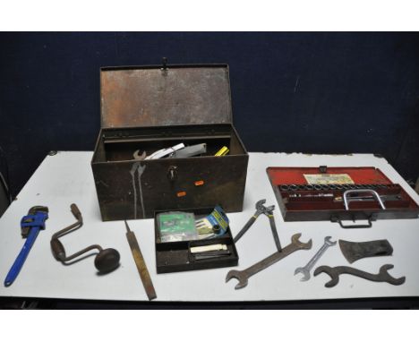 A VINTAGE METAL TOOLBOX containing some tools, spanners, chisels, hand drill, Stillson's, files etc along with a cased Britoi