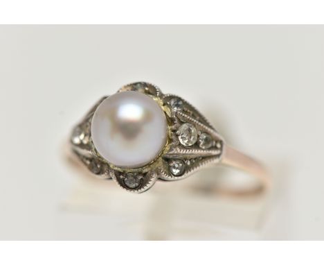 A CULTURED BAROQUE PEARL RING, pearl measuring approximately 6.5mm, in a surround of colourless spinels mounted in white meta