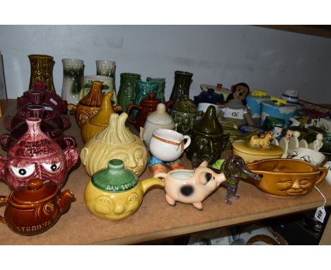 A COLLECTION OF NOVELTY AND ADVERTISING CERAMICS, to include twenty four face pots by Price Kensington, Sadler, Unique Potter