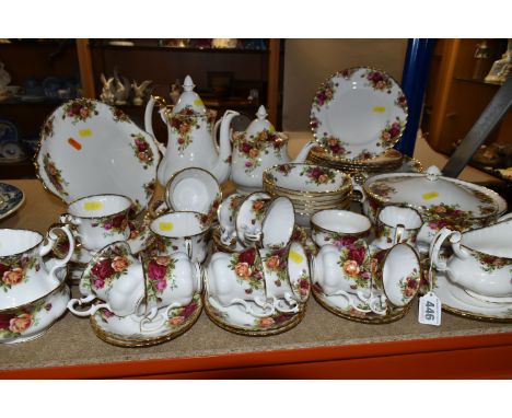 A ROYAL ALBERT 'OLD COUNTRY ROSES' PATTERN TEA AND COFFEE SET, comprising coffee pot, cream jug, sugar bowl, six cups (one so