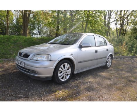 A VAUXHALL ASTRA FOUR DOOR SRI 1.8L PETROL CAR, silver in colour, with two keys and v5, registratioin plate Y956 WDC, first r