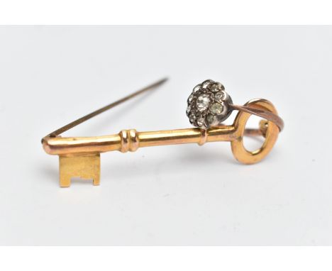 A 9CT GOLD BROOCH AND A CLUSTER RING, the brooch in the form of a key, hallmarked 9ct Chester 1947, fitted with a brooch pin 