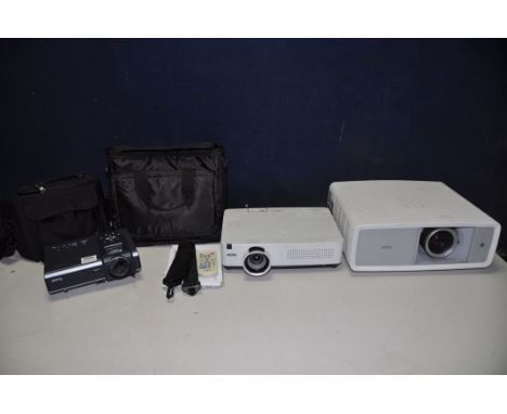 A SANYO PLV-2700 PROJECTOR with no power cable, Sanyo PLC-WXU300 with no power cable and a Benq PB-2250 (all UNTESTED)