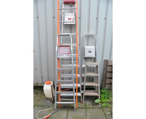 A SELECTION OF LADDERS to include a set of abru four step stepladders, an unbranded set of stepladders, Tubesca ladder and a 