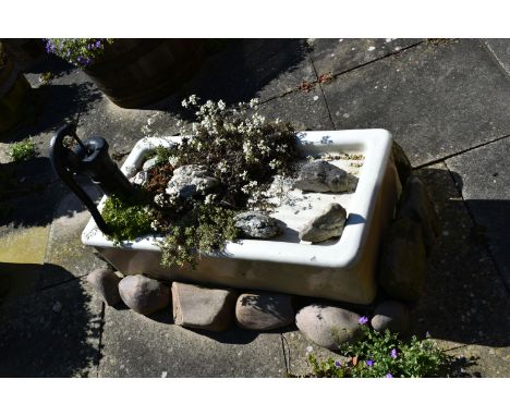 A VINTAGE ENAMEL SINK WITH DRAINER width 92cm depth 45cm height 24cm along with a series of sandstone blocks and a vintage wa