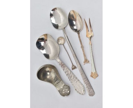 AN ARTS AND CRAFTS PEWTER CADDY SPOON BY JOHN H GREEN AND A FIVE OTHER ITEMS OF FLATWARE, the caddy spoon with hand hammered 