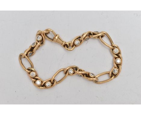 A 9CT GOLD BRACELET, figaro chain bracelet set with colourless cubic zirconia, hallmarked 9ct Birmingham, fitted with a lobst